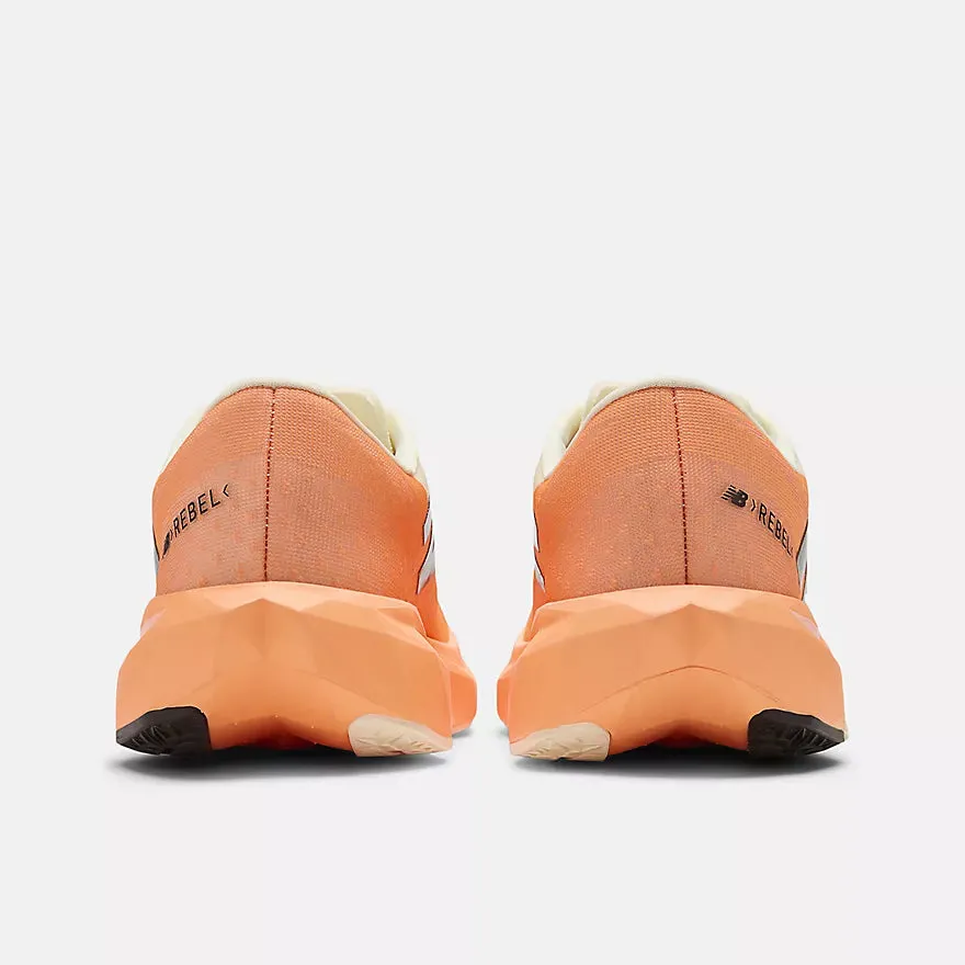 treadmill running shoe space running in a lava field area shoes New Balance Men's FuelCell Rebel v4 (Hot Mango with Angora and Black)