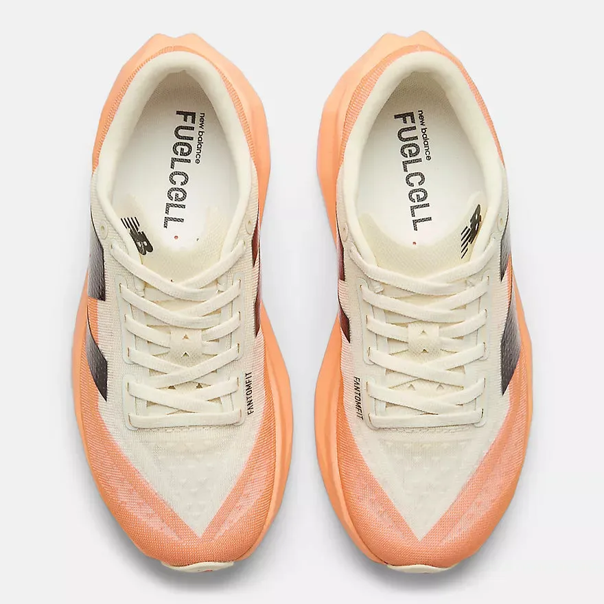 New Balance Men's FuelCell Rebel v4 (Hot Mango with Angora and Black) running in narrow tracks shoes