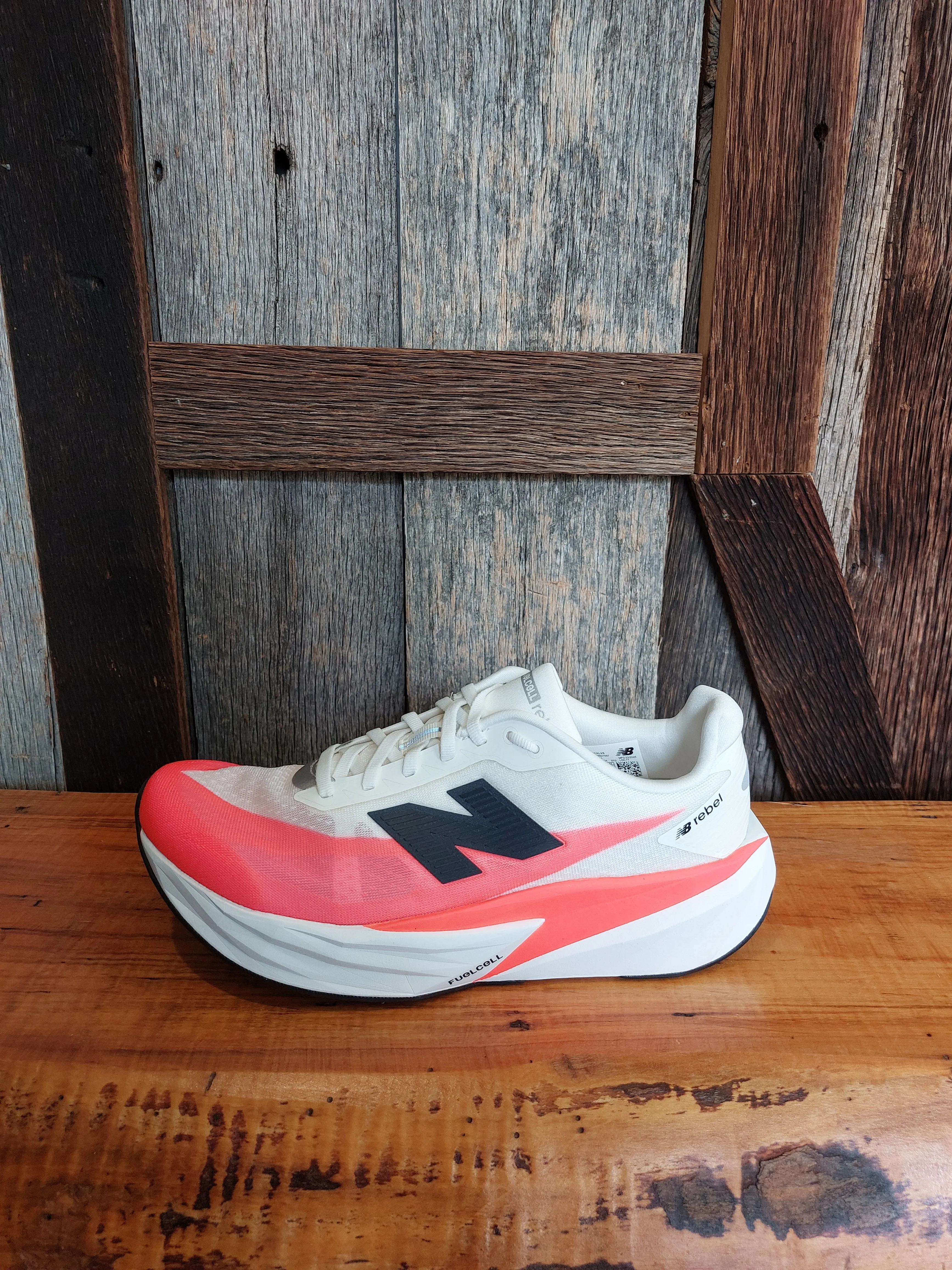 running with a smooth outsole M New Balance FuelCell Rebel v5