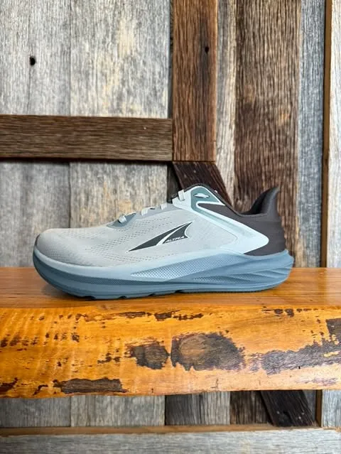 Sports teams running legacy M Altra Torin 8